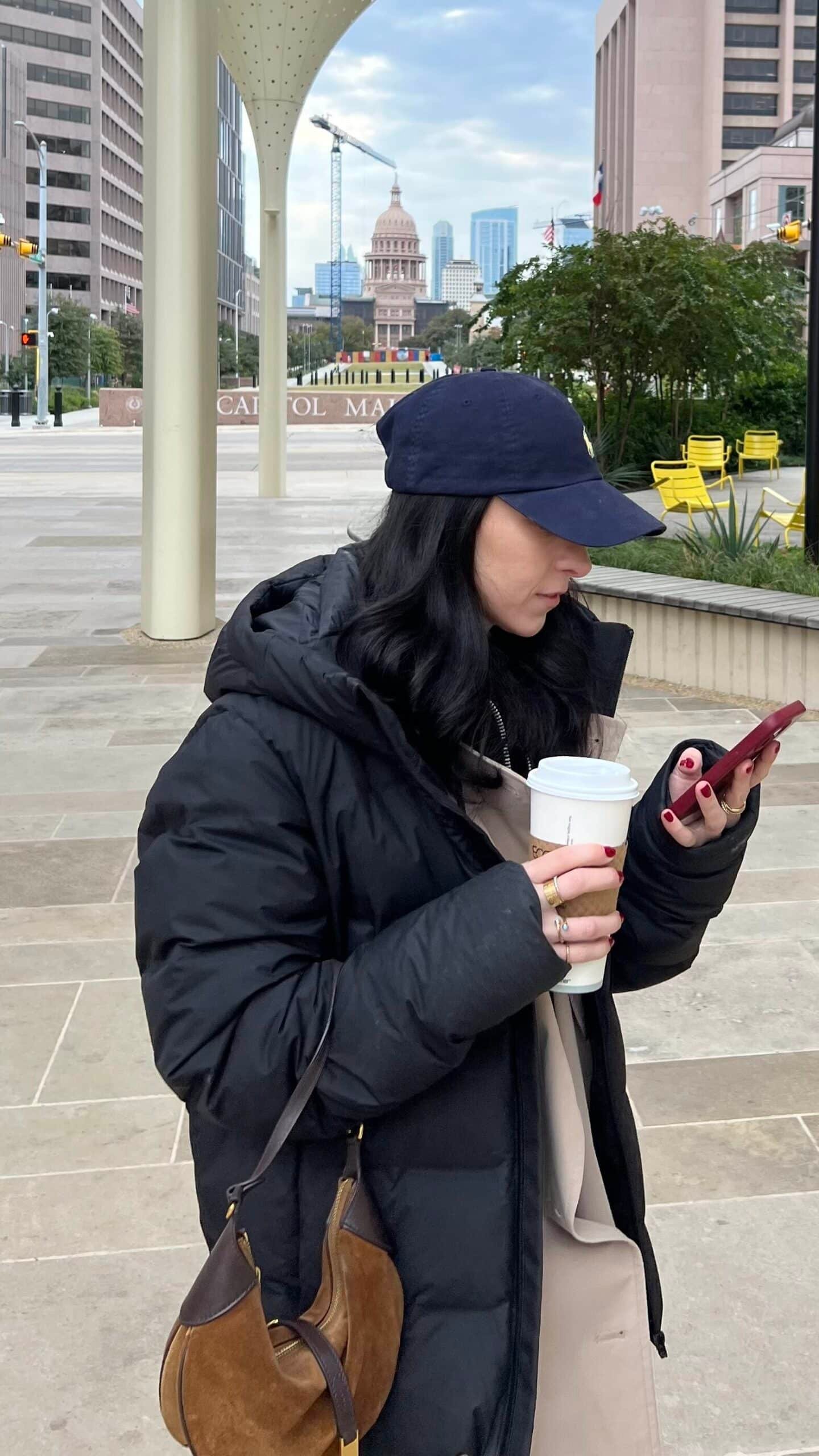 Women wearing ralph lauren polo accessories like a had and purse.